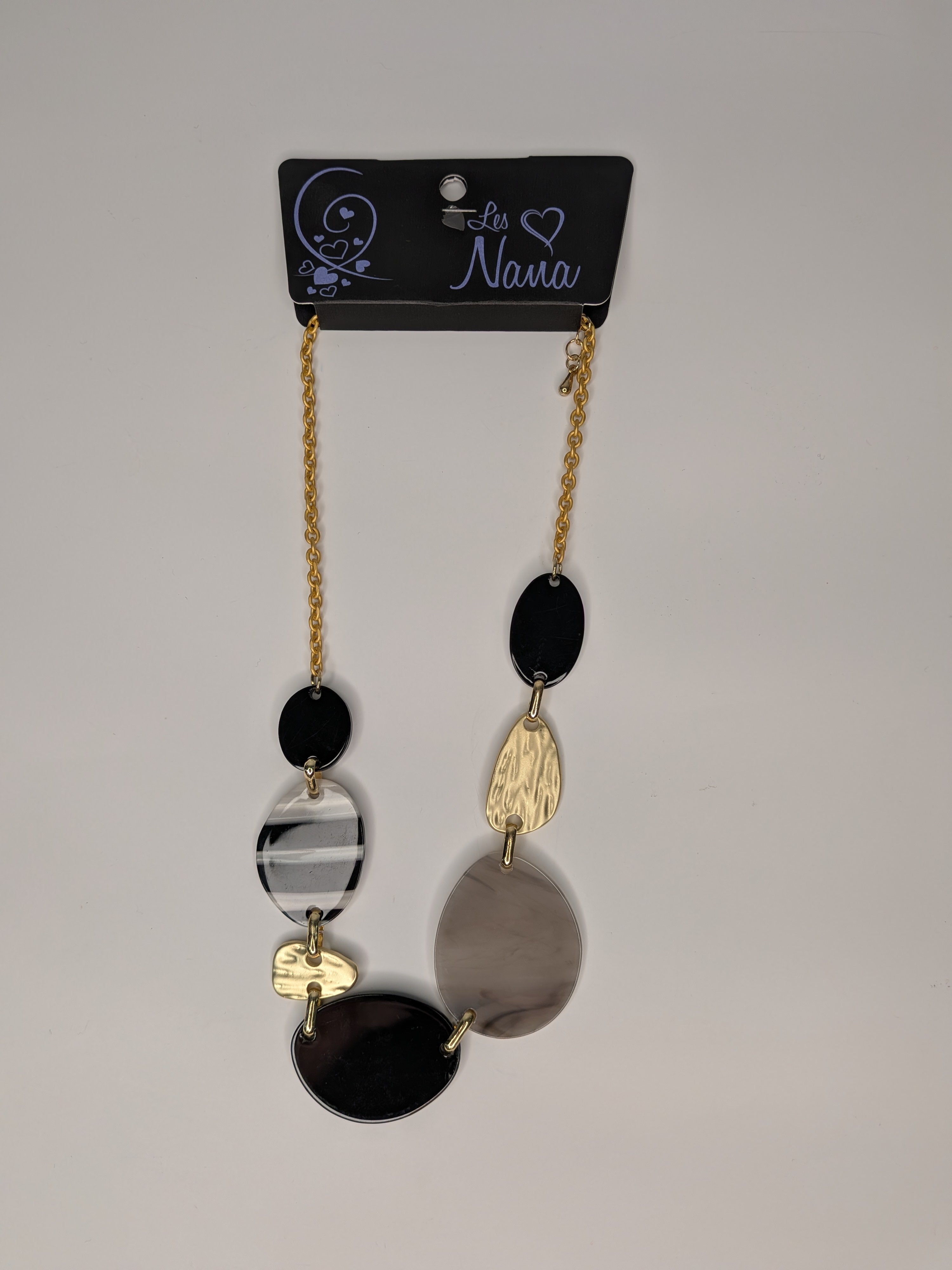 Collier asymétrique à disques noirs, gris et or