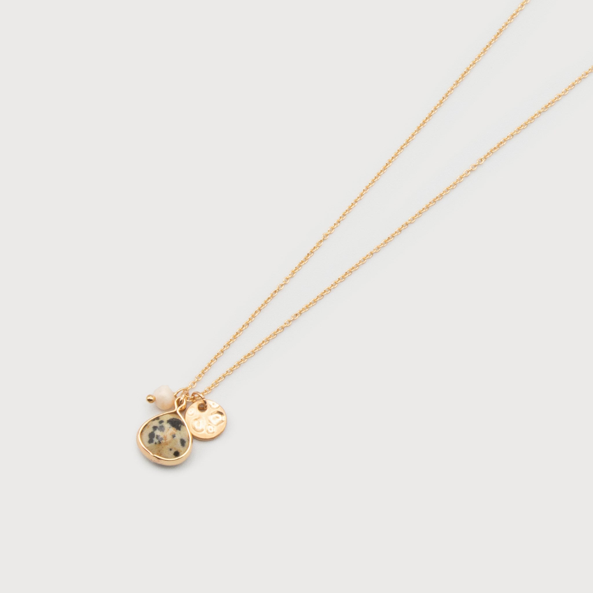 Collier délicat gris et or avec deux pendentifs ronds