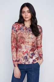"Chandail en tricot léger pour femme avec un imprimé abstrait multicolore. Mélange de Viscose, Polyester et Nylon. Marque Coco Y Club."