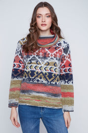 Chandail en tricot pour femme, avec col baveux drapé et motif Azthèque. Tissu doux en acrylique, nylon et polyester. Marque Coco Y Club.