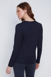 Chandail manches longues Cyc Coco Y Club, avec un zip au col. Idéal pour être porté sous un manteau, disponible en ivoire, marine ou noir.