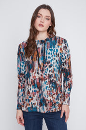 Chandail léger à manches longues pour femme, motif imprimé multicolore avec cordons de serrage au col. Tissu extensible 95% polyester, 5% spandex. Marque Coco Y Club.