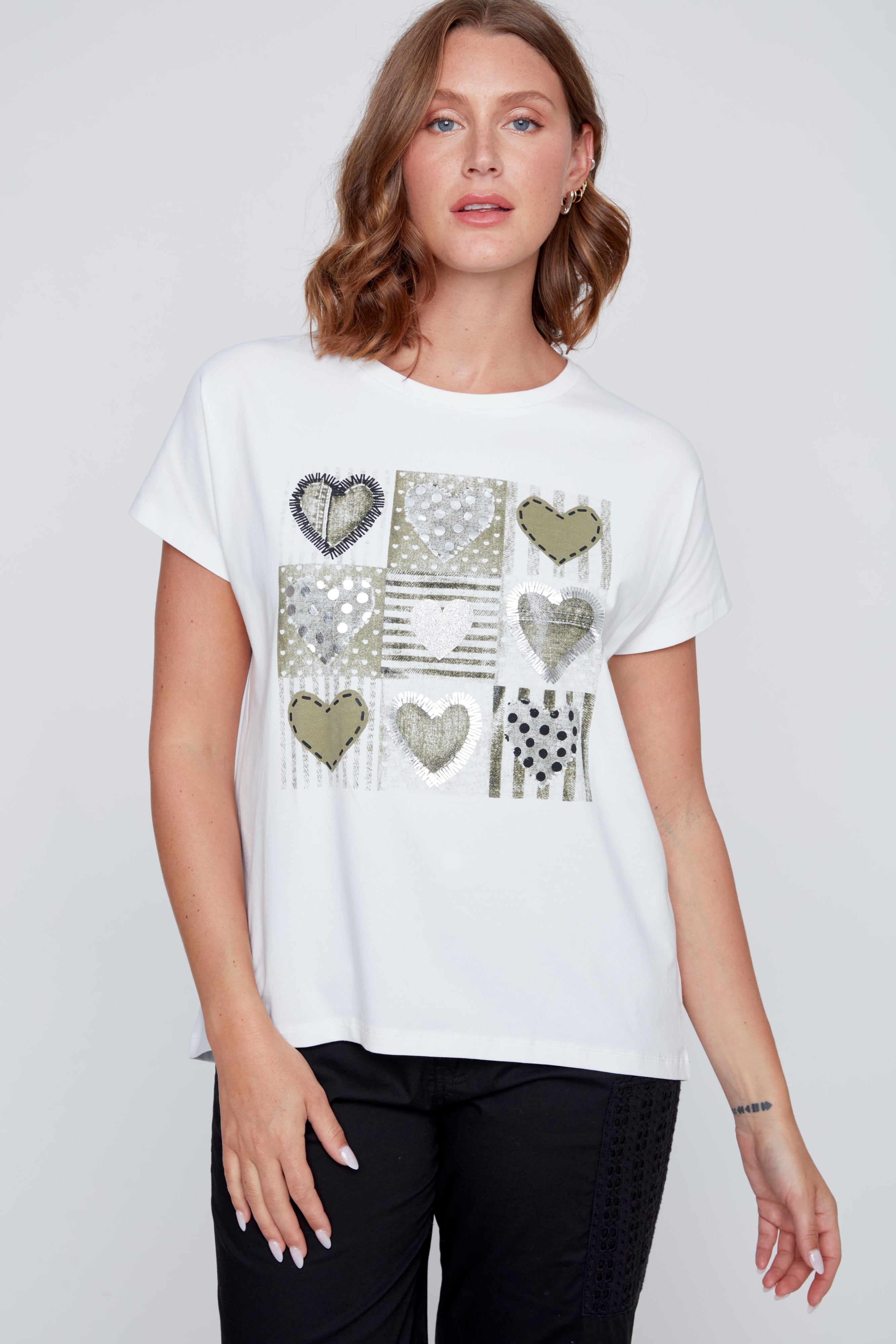 Chandail ample blanc à manches courtes avec imprimé et inscription « rien ne se perd », style décontracté et léger.