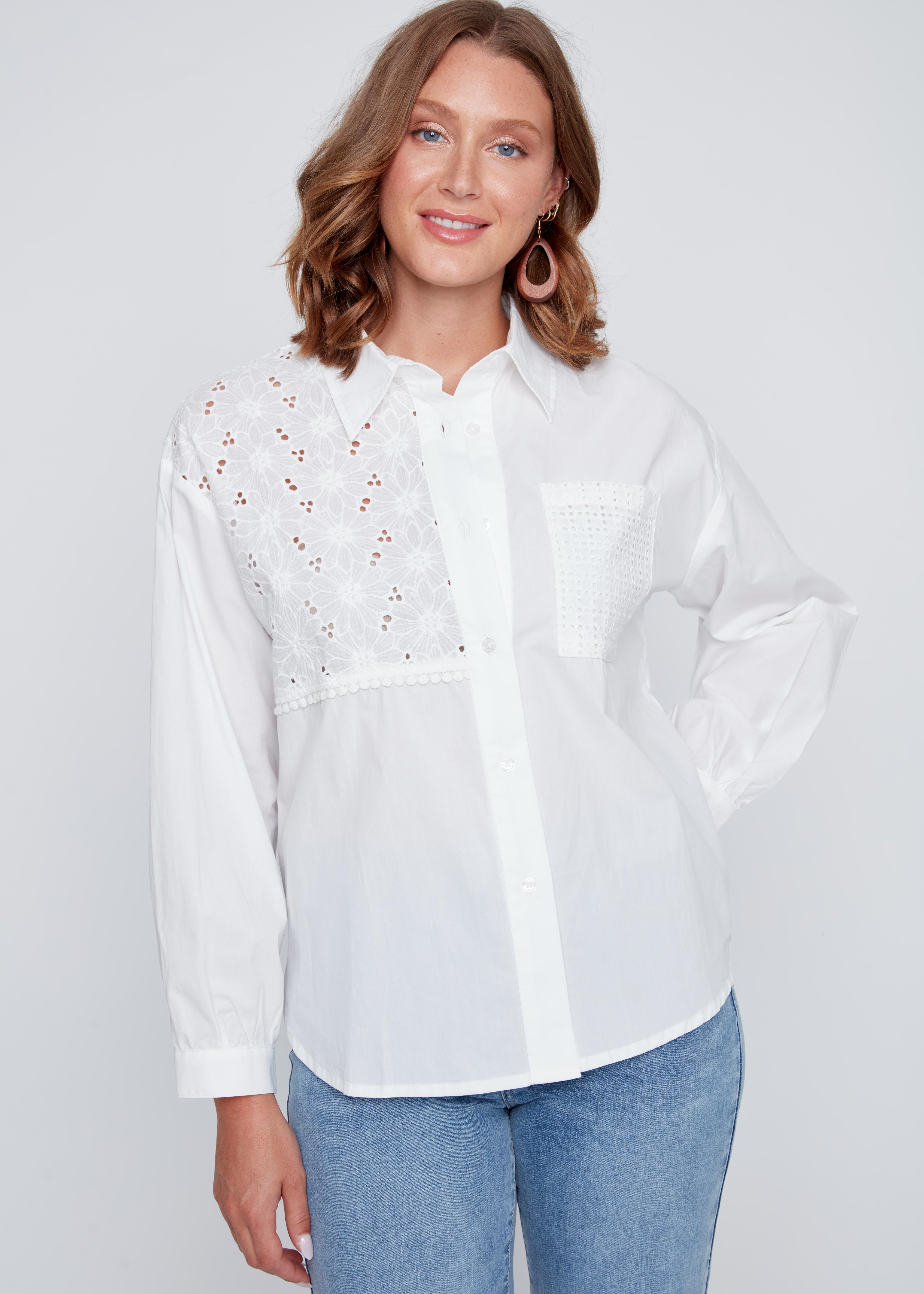 Chemisier blanc avec broderie anglaise, style délicat et féminin, tissu en coton respirant.