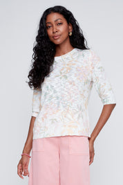 Chandail en tricot ivoire à imprimé fleurs, manches au coude, style féminin et polyvalent.