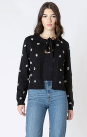Cardigan noir pour femme à nouer à l'avant, orné de strass décoratifs. Tissu en tricot doux : 50% Viscose, 28% Polyester, 22% Nylon. Marque Dex.