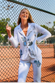 Veston sport avec imprimé graffiti coloré, détails de strass et deux poches, style chic et décontracté.