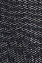 Détail du tricot noir ajouré légèrement scintillant