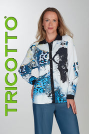 Chemisier long pour femme, entièrement imprimé dans des couleurs bleu, noir et jaune. Tissu 100% polyester fluide. Marque Tricotto.