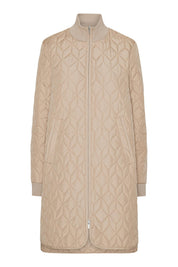 Manteau long matelassé beige blé à motif géométrique Ilse Jacobsen