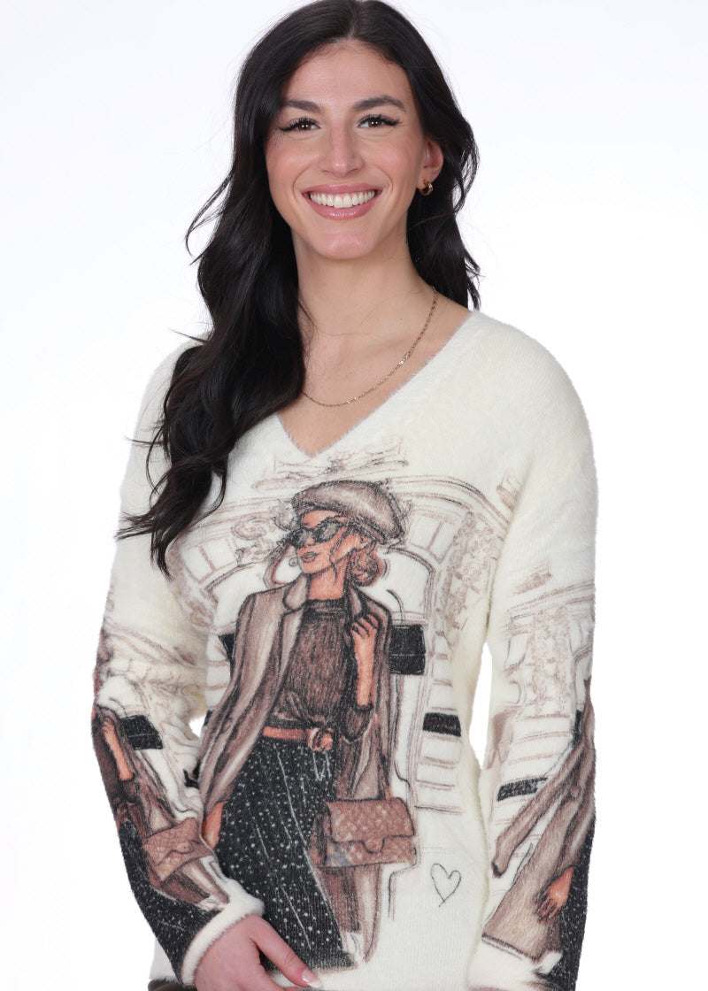 Chandail ultra- doux effet peluche pour femme, de couleur ivoire, avec un col en V classique. Composition 100% Polyamide. Marque NESS.