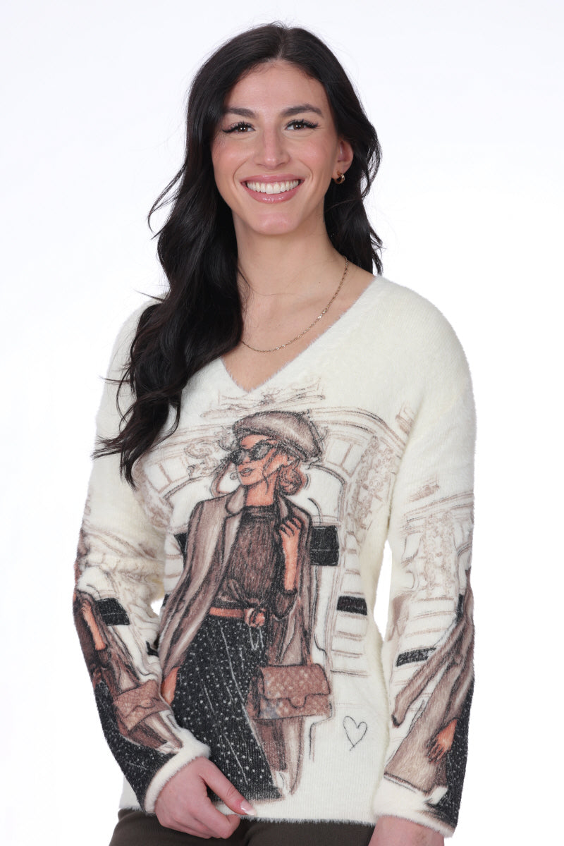 Chandail ultra- doux effet peluche pour femme, de couleur ivoire, avec un col en V classique. Composition 100% Polyamide. Marque NESS.