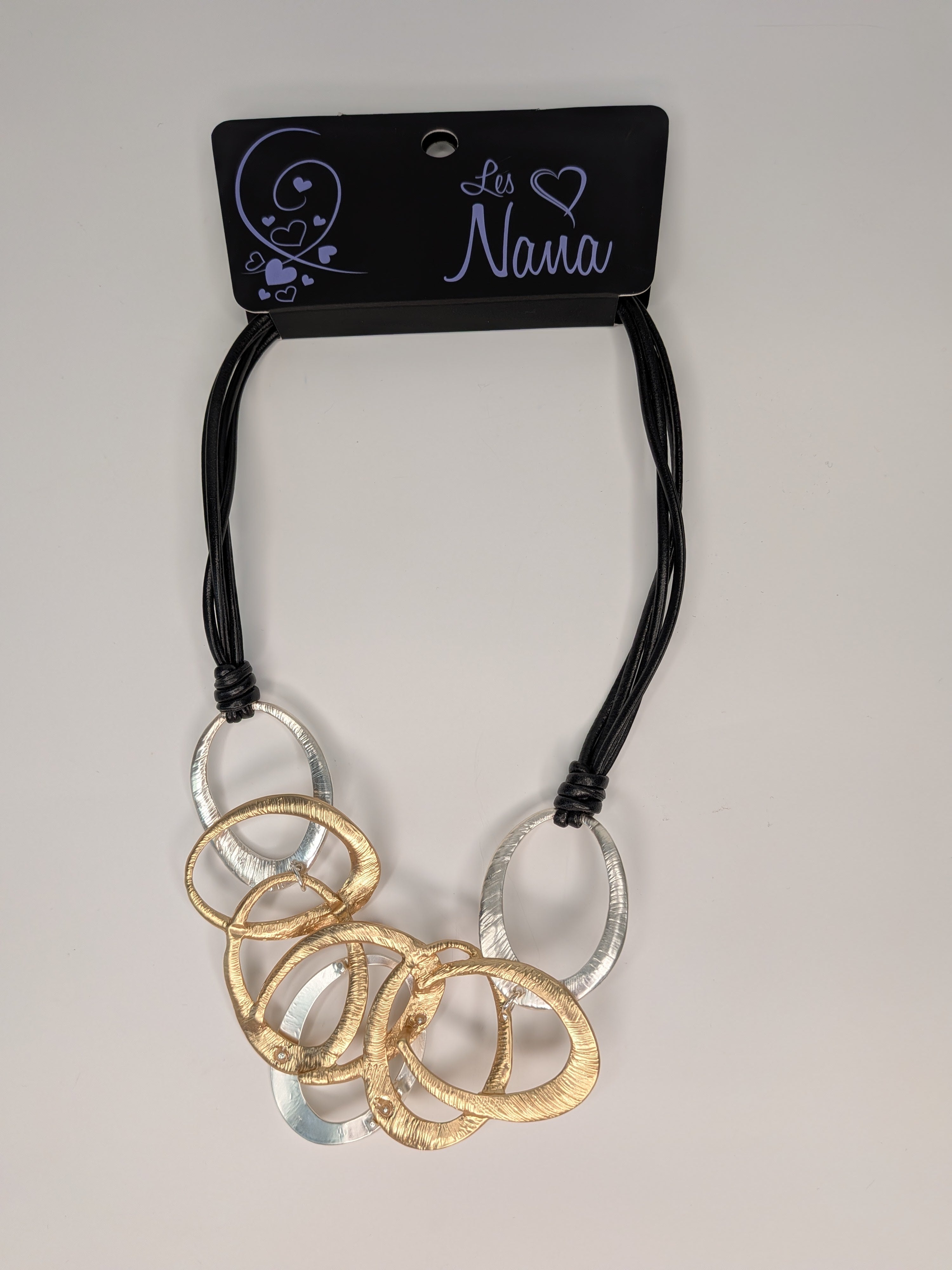 Collier noir à grands anneaux entrelacés or et argent