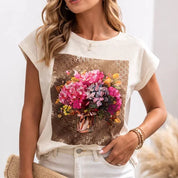 T-shirt pour femme à manches courtes blanc avec imprimé de bouquet de fleurs, style doux et confortable en coton.