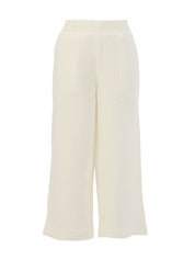 Pantalon cheville léger pour femme de couleur blanche, tissu fluide avec finitions soignées.